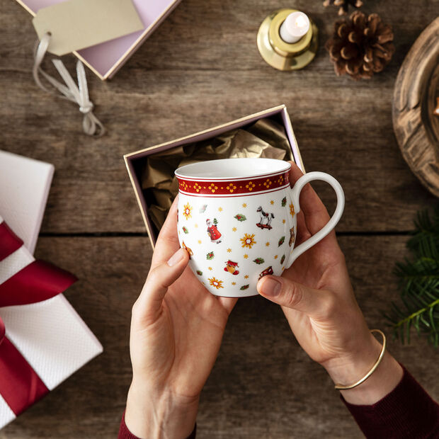 Toy's Delight coffee mug with scattered pattern